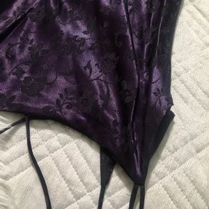 Floor length dark purple dress with strappy back